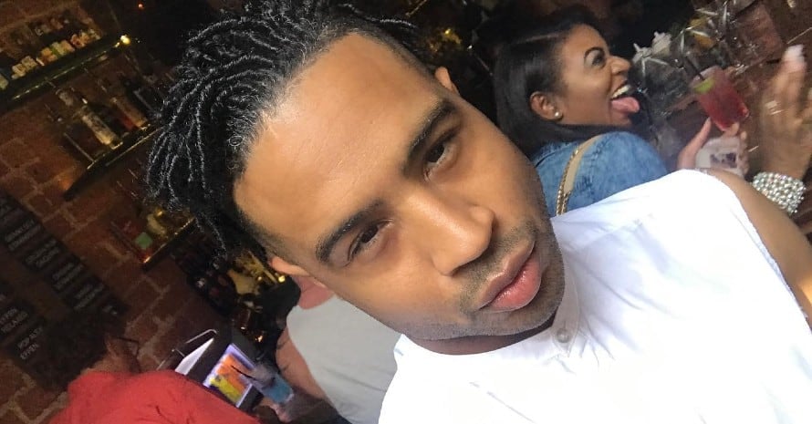 man with dreadlocks in polo g hairstyle