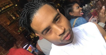 man with dreadlocks in polo g hairstyle