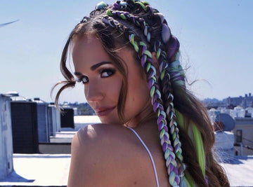 girl with purple and brown side braids